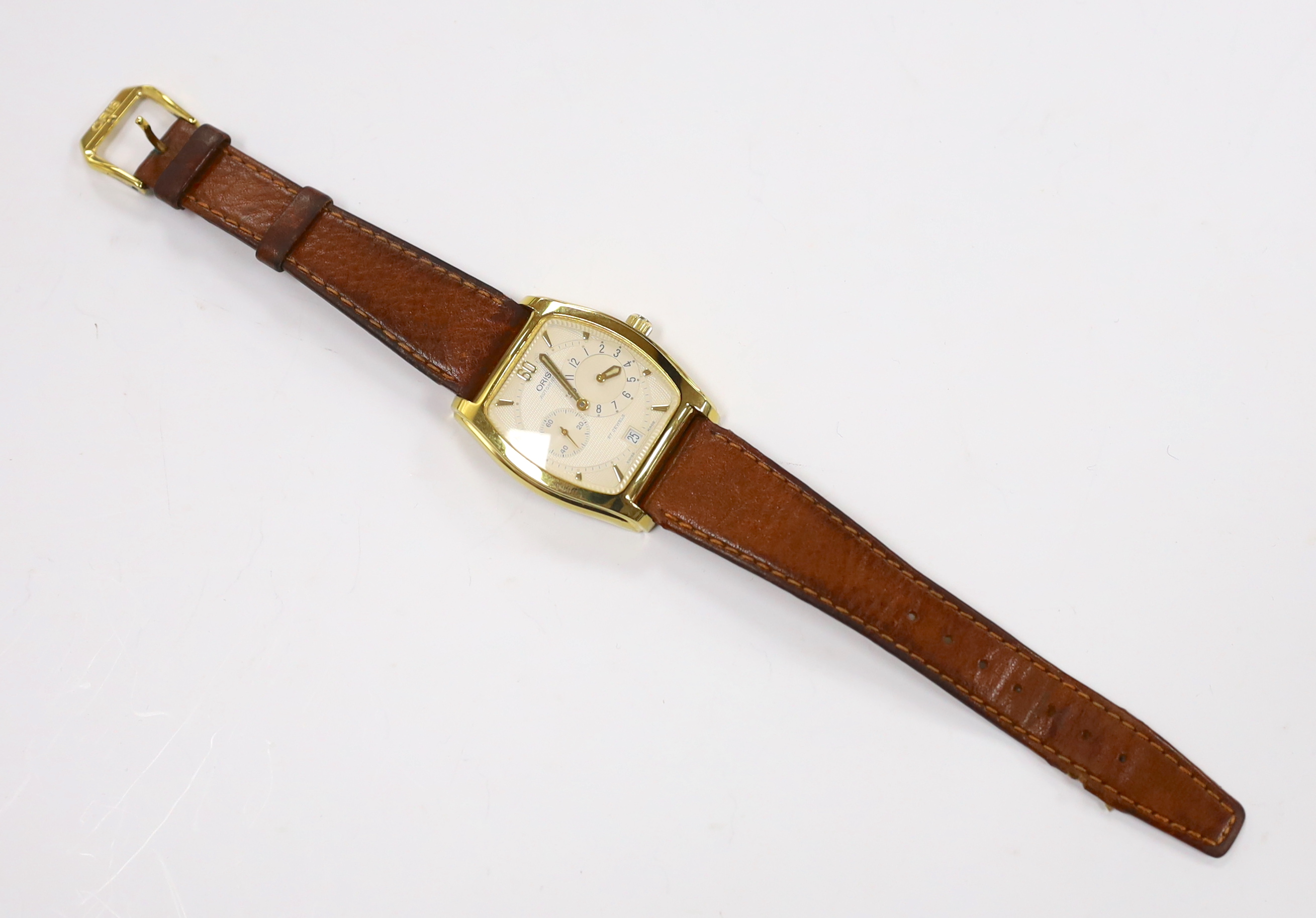 A gentleman's steel and gold plated Oris Automatic wrist watch with tonneau case and two subsidiary dials, on a leather strap with Oris buckle, case diameter 33mm, with Oris box.